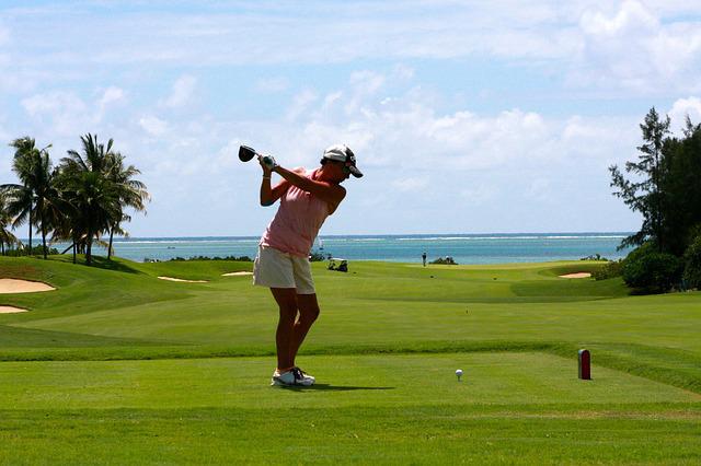 woman playing golf