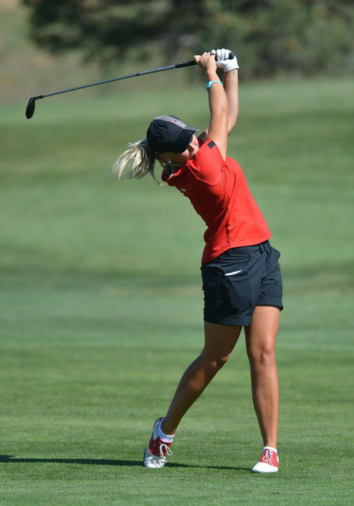 woman playing golf